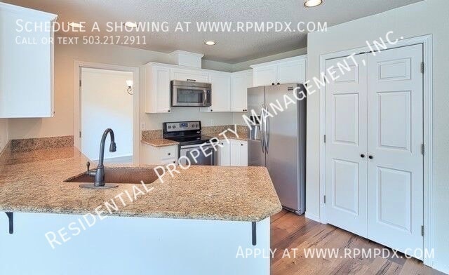 Building Photo - 23992 SW Red Fern Dr