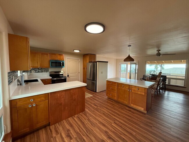 Building Photo - Upper Kalaheo, fully renovated three-bedroom two bathroom home.