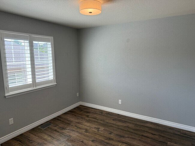 Building Photo - Greenbelt-Backed Wheatlands Home - Mountain Views, 3 Car Garage & Finished Basement
