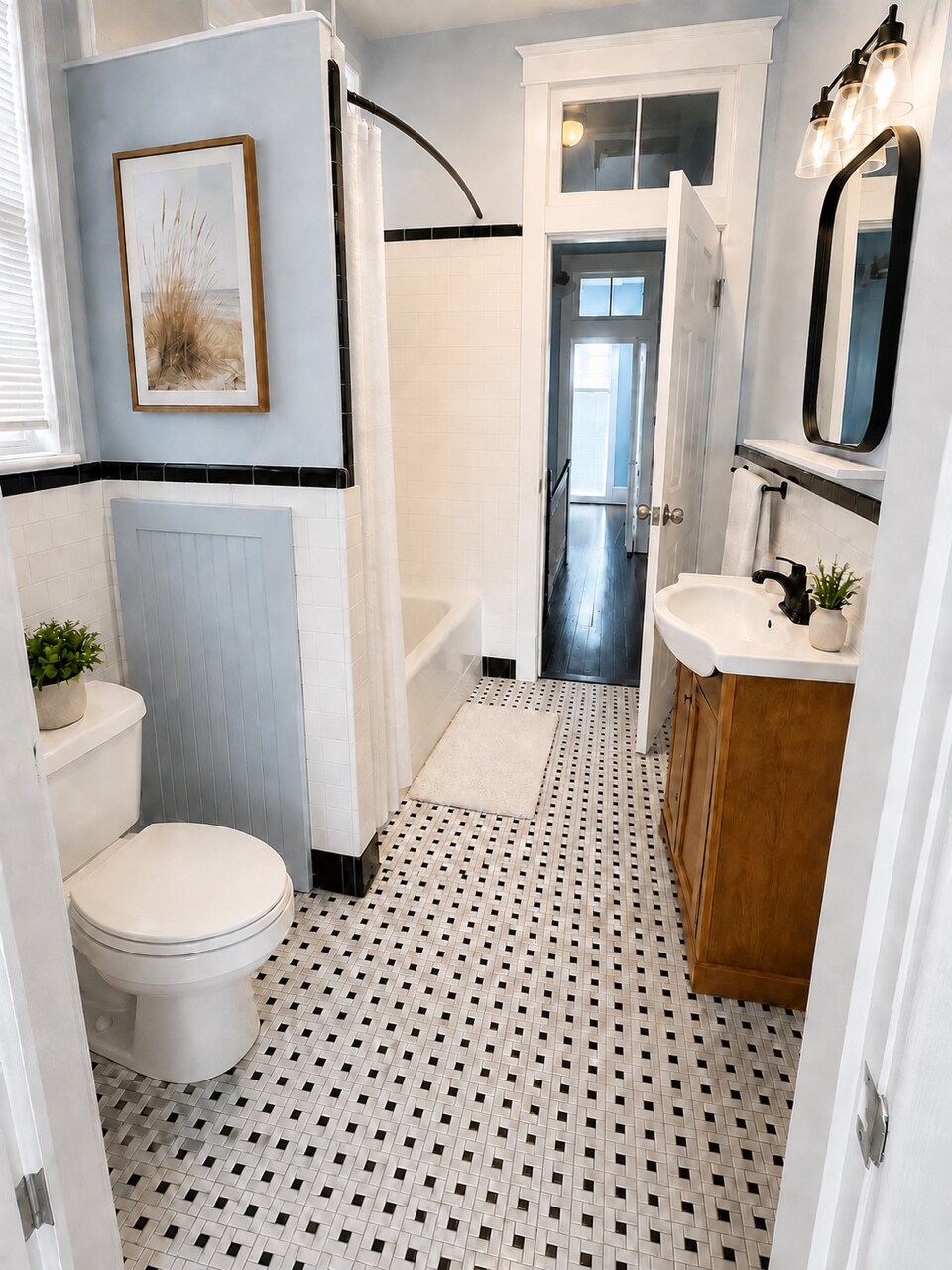 Updated full bathroom - 319 W 33rd St