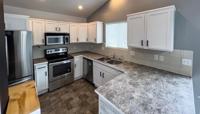 Building Photo - 4 Bedroom in Cheney