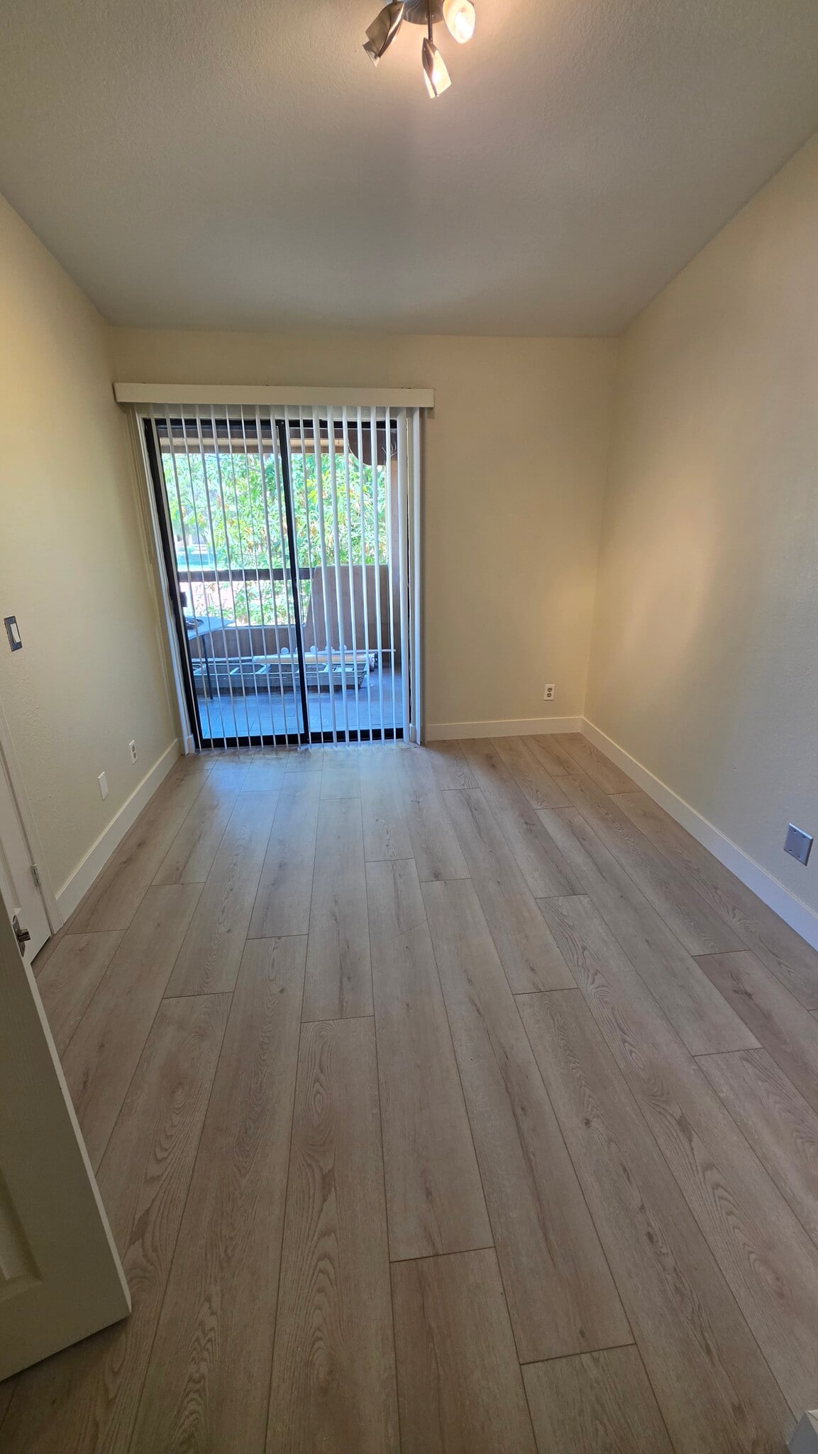 2nd Bedroom toward patio - 1351 N Pleasant Dr