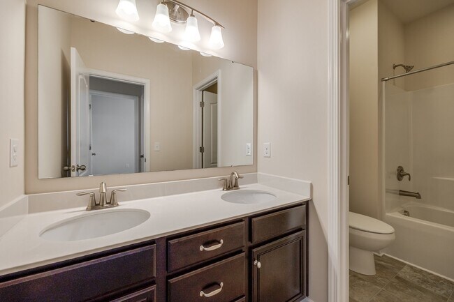 Building Photo - "Spacious 4-Bedroom Retreat with 3 Full Ba...