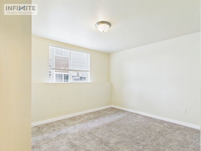 Building Photo - Cute As A Button 2 Bedroom Condo on Baxter Lane!