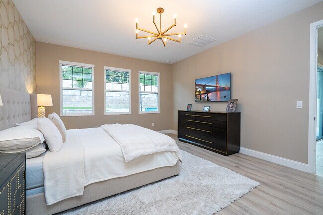 Building Photo - "Spacious 4-Bedroom Retreat with 3 Full Baths in Winter Garden's Serene Sanctuary"