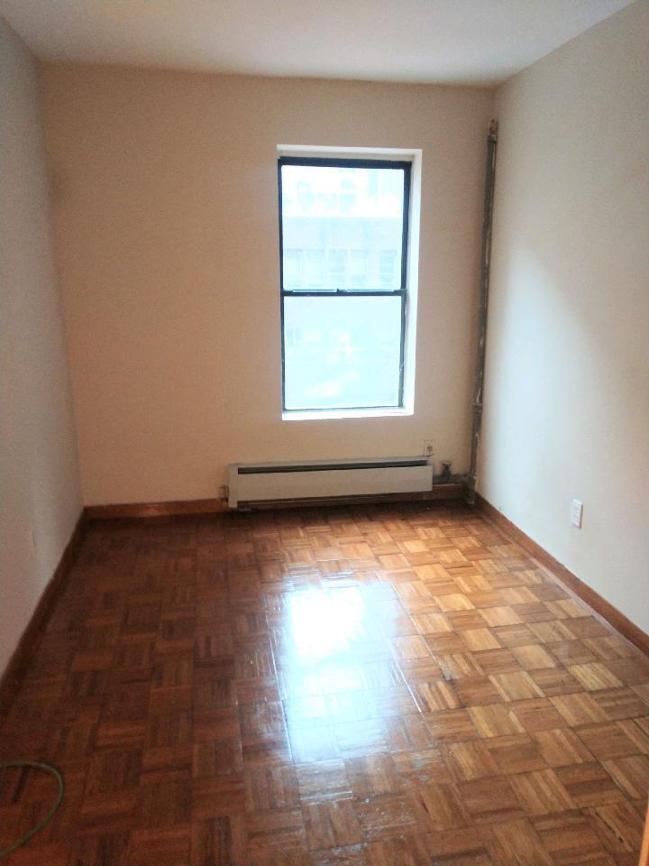 Bright bedroom queen size bed possible - 240 E 23rd St