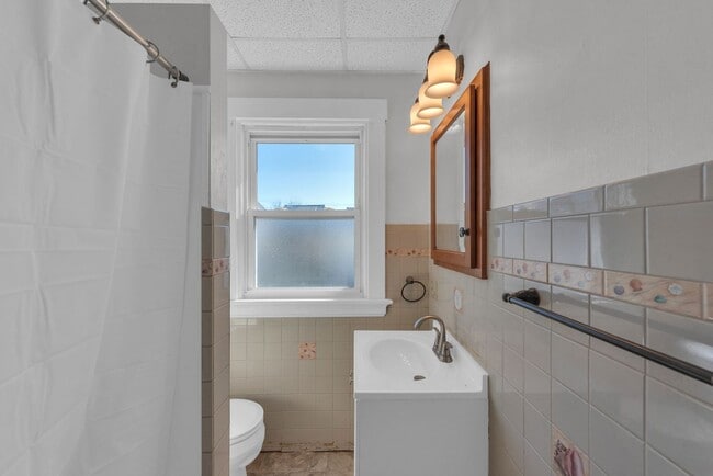 Building Photo - NORWOOD – Stunning Old-World Charm with Modern Comforts