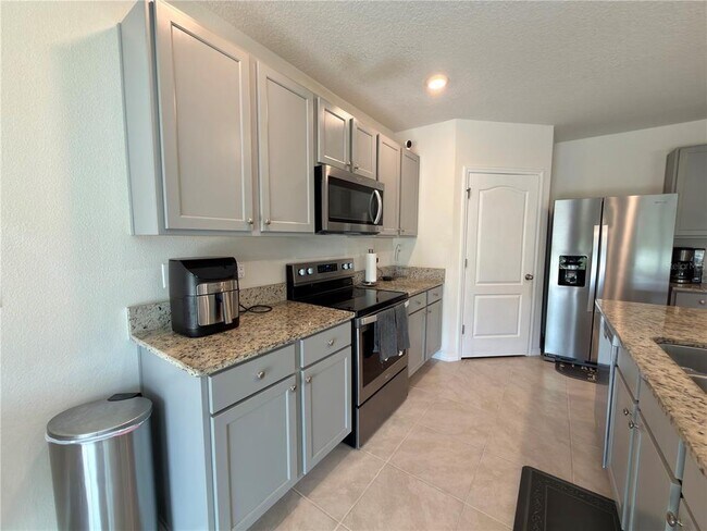 Building Photo - 9004 Tuscan Cypress St