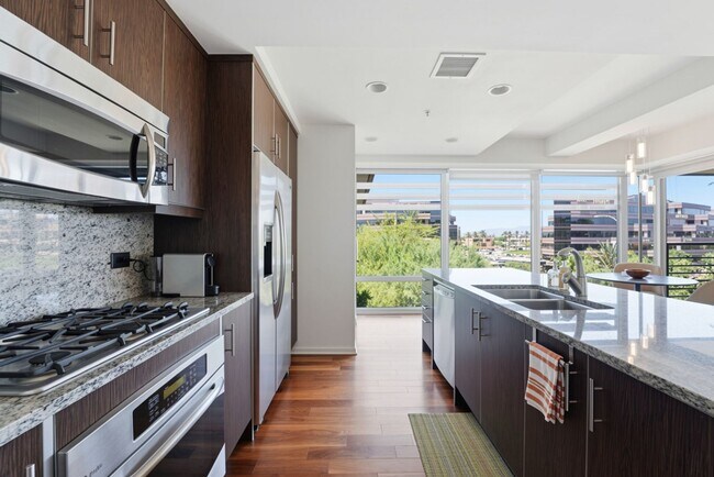 Building Photo - Luxury Corner Unit with Panoramic Mountain Views at Optima Camelview!