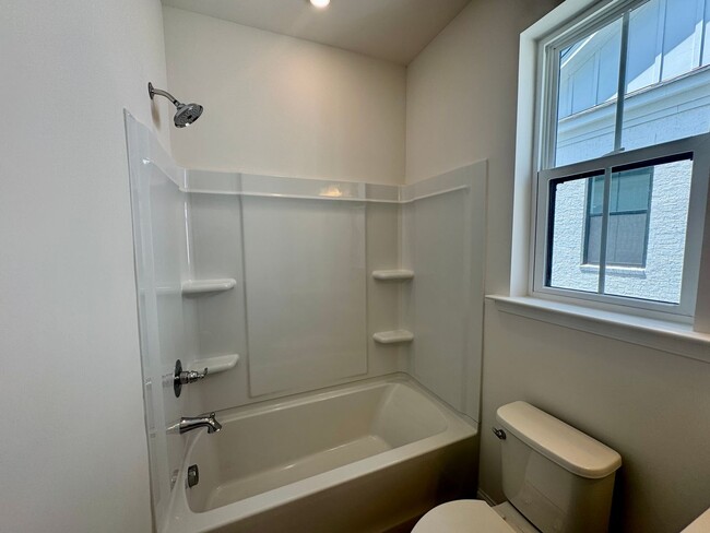 Building Photo - Beautiful New Construction, Three Story To...