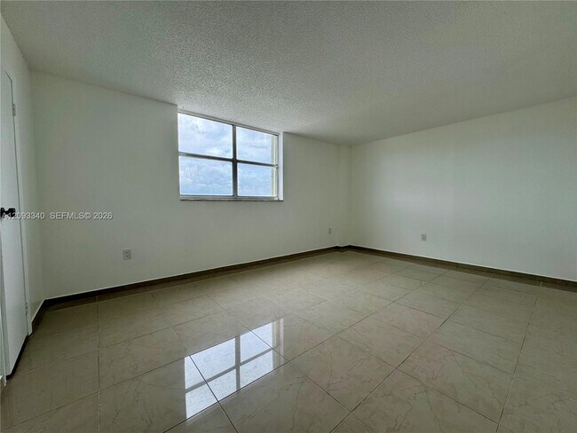 Building Photo - 4675 W 18th Ct