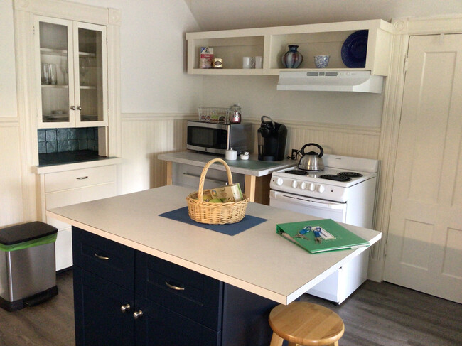 KITCHEN ISLAND AND BUILT-IN CHINA CABINET - 35 Park Pl