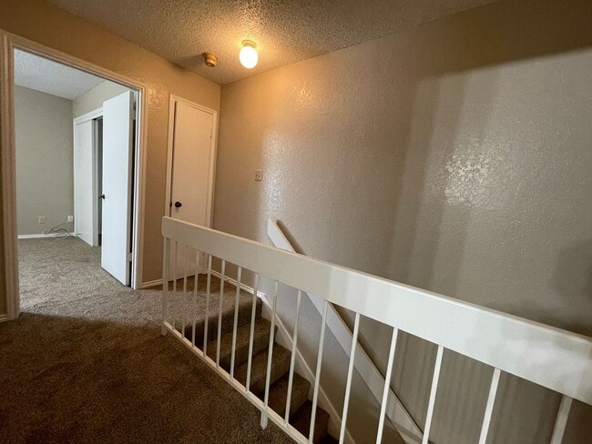 Building Photo - AVAILABLE NOW 2 BEDROOM 1.5 BATH TOWNHOME ...
