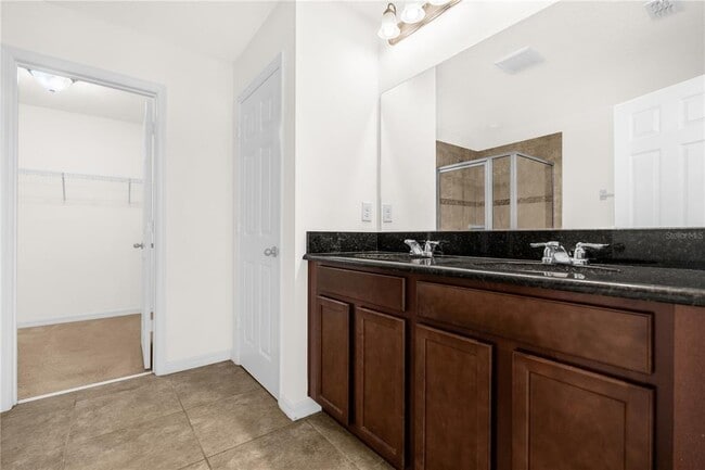 Building Photo - 8130 Red Stopper Ln