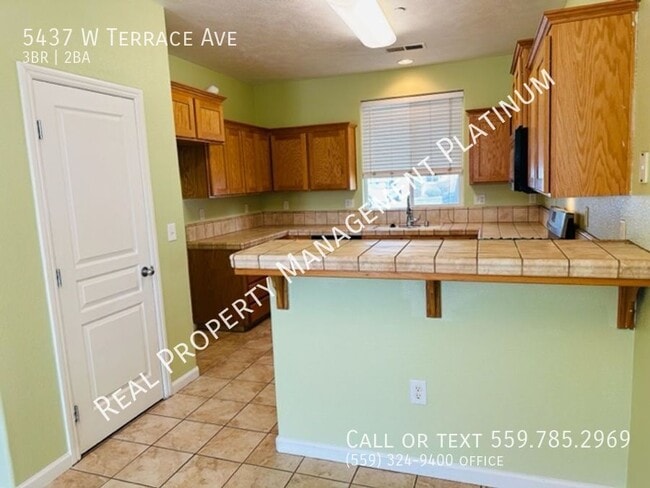 Building Photo - 5437 W Terrace Ave