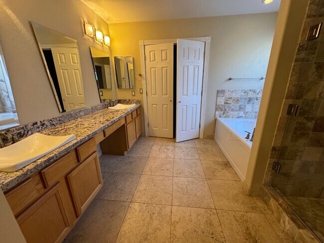 Building Photo - Spacious 4-Bedroom Home with Main-Level Primary Suite & 3-Car Garage