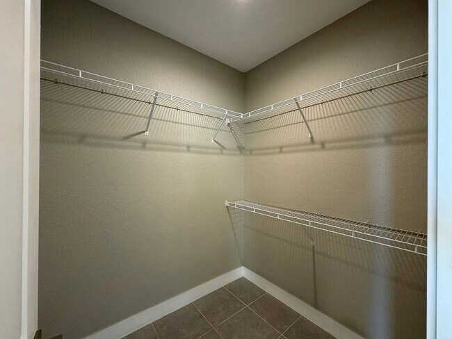 Building Photo - Beautiful New 3-Bedroom Home with Spacious Layout & 2-Car Garage in Poinciana Villages