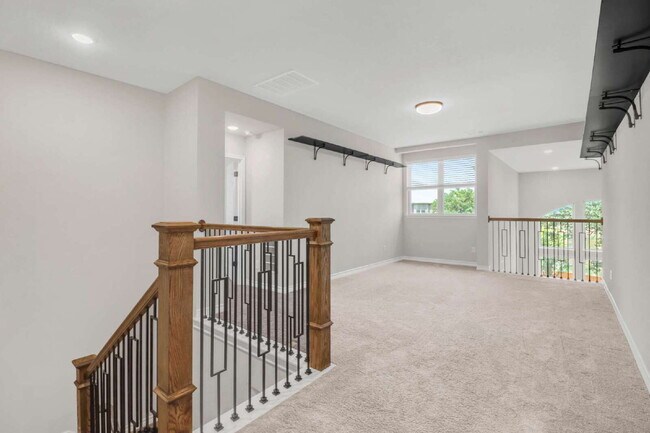 Building Photo - ASK ABOUT FREE APPLICATIONS THROUGH AUGUST!  "Spacious 4-Bedroom Sanctuary with Cozy Fireplace in...