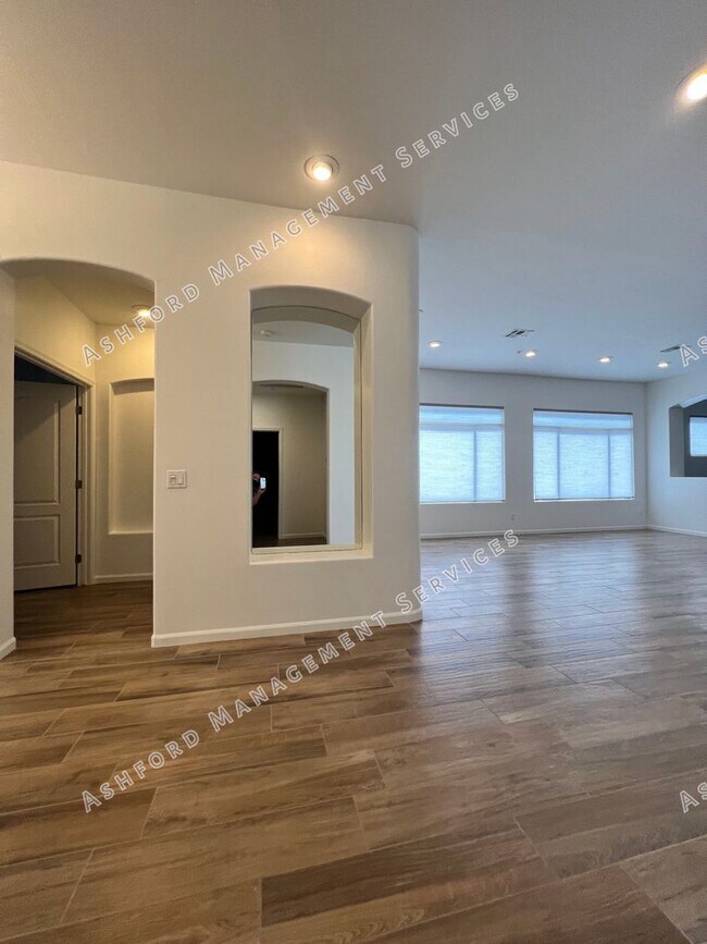 Building Photo - COME HOME TO LUXURY IN GATED GRAYHAWK GOLF...