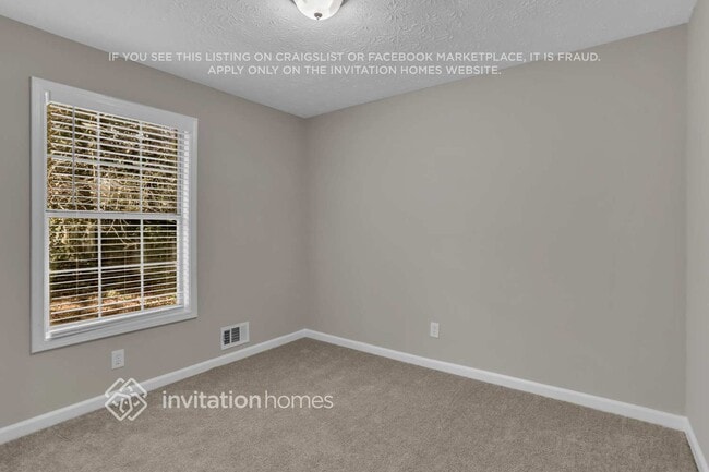 Building Photo - 6017 Happy Trails Ct