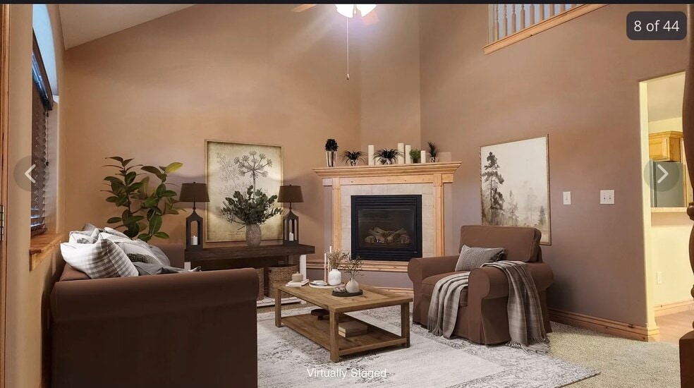 Living room with gas fireplace - 524 E Broadway St