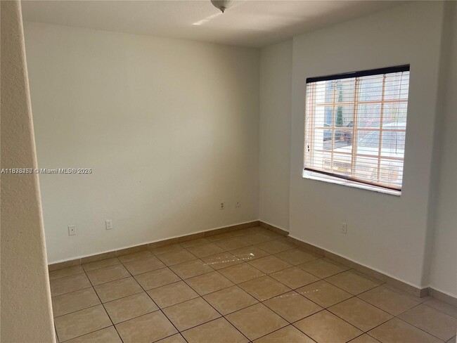 Building Photo - 7090 NW 174th Terrace