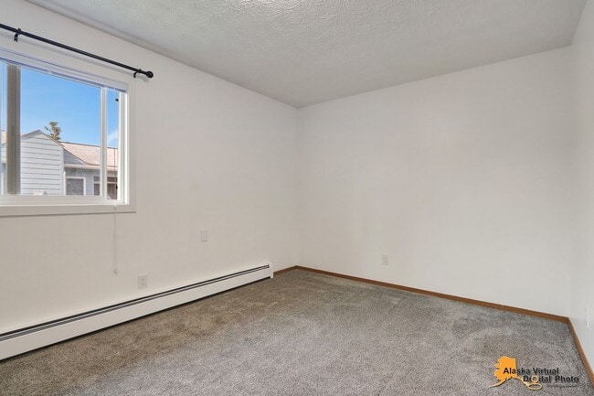 Building Photo - 1810 E 72nd Ave