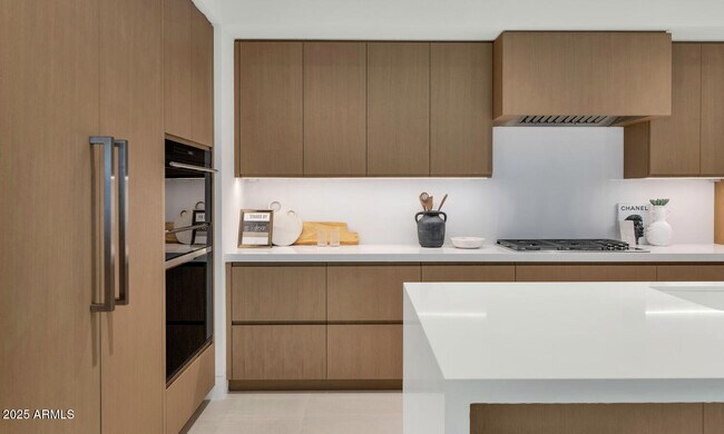 Building Photo - 6587 N Palmeraie Blvd