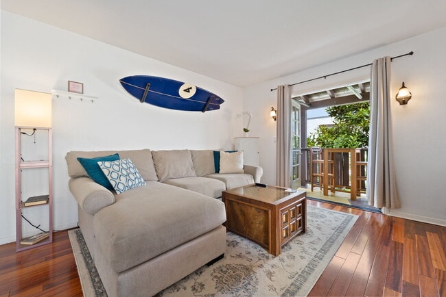 Living room to east facing balcony - 709 Agate St