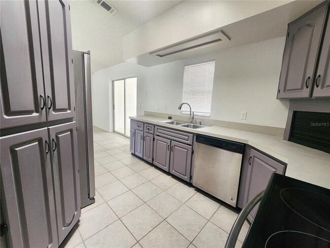 Building Photo - 9392 N Sandree Dr