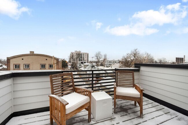 Building Photo - Modern 2-Bedroom Rowhome with Rooftop Moun...