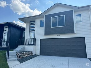 Building Photo - Luxury Bennington Townhome Ready For Move In