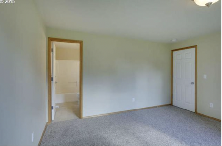 Bedroom 3- now with wood floor - 6925 SE 65th Ave