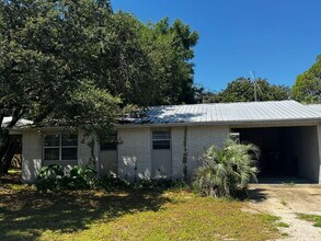 Building Photo - "Charming 2-Bedroom Retreat in Destin – Co...
