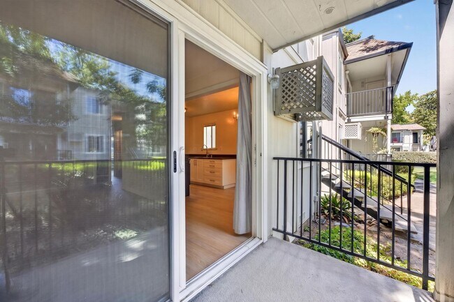 Building Photo - Beautifully Updated 2BR Condo with New Appliances & Community Pool