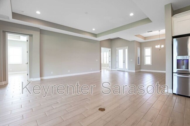 Building Photo - 6133 Lungo Lago Dr