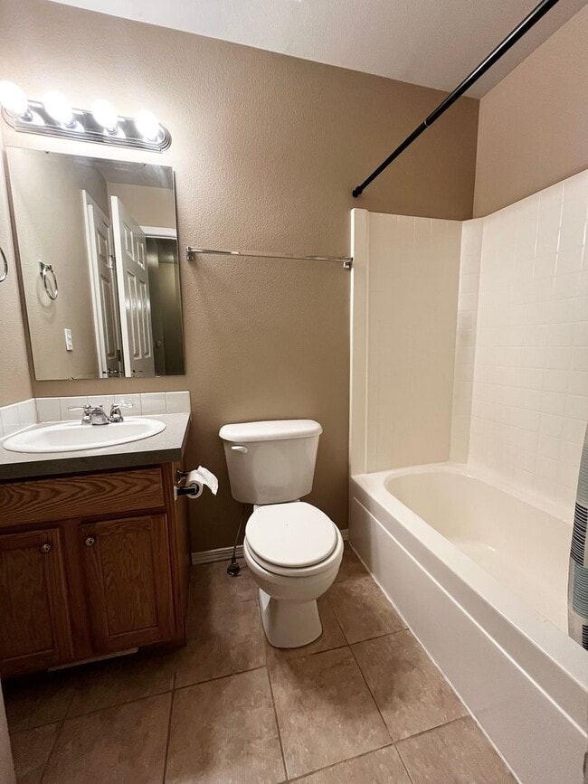 Building Photo - 4 Bedroom Home with Bonus Room Potential & RV Parking!