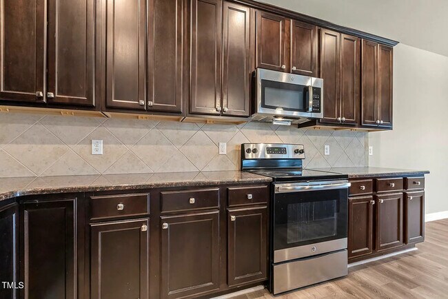 Building Photo - Earn Wealth While Leasing - Like a Homeown...