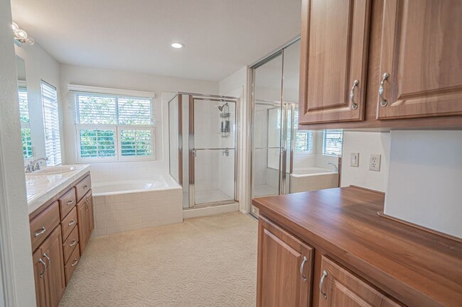 Building Photo - Stunning 4-Bedroom Home with Downstairs Bed/Bath, Views, and Remodeled Kitchen!