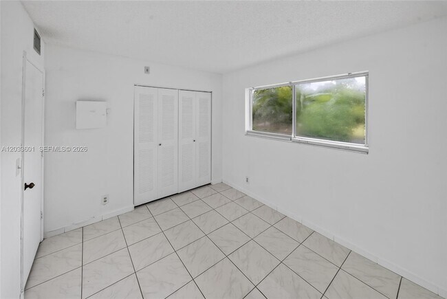 Building Photo - 8750 N Sherman Cir