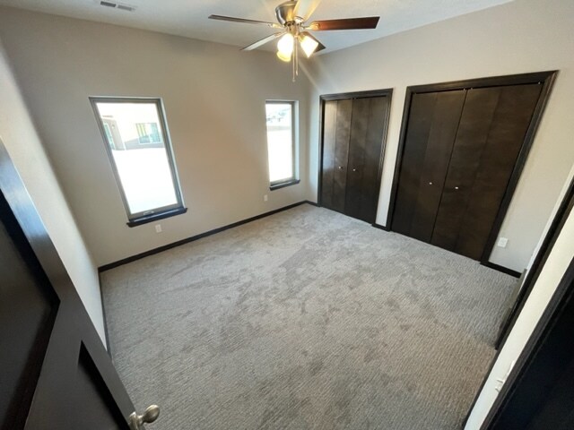 Primary bedroom with double closets - 9402 W Dolores Dr