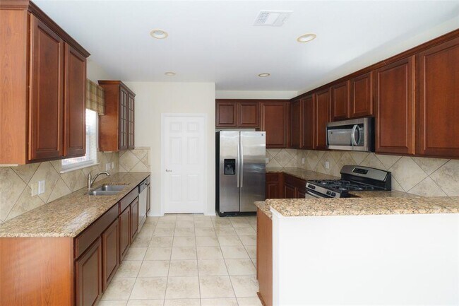 Building Photo - 8528 Harrier Dr