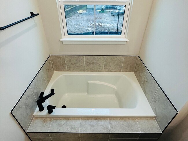 Building Photo - New Construction • 4 BR • 2 Full / 2 Half BA • End Unit Townhome in Village Town – Fayetteville’s...