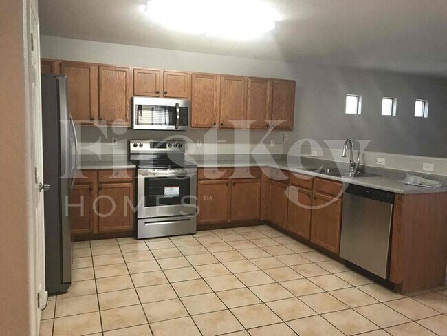 Building Photo - 8334 W Hughes Dr