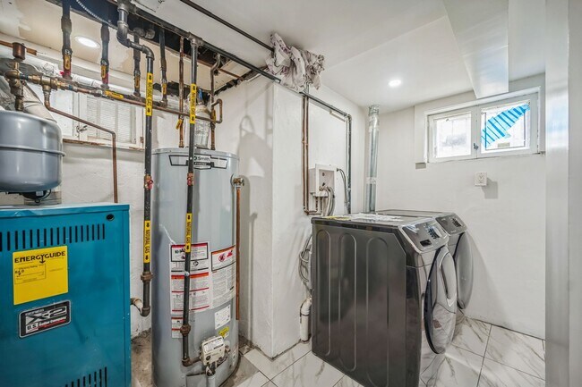 Building Photo - Experience Modern Luxury: Fully Renovated ...