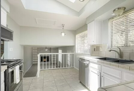 View from Kitchen into Family Room - 18863 east milan