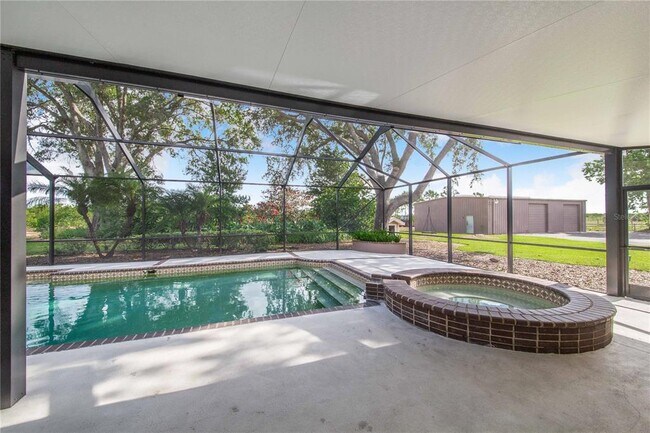 Building Photo - 7740 Lake Hatchineha Rd