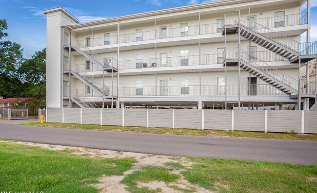 Building Photo - The Sand Dollar Condominiums
