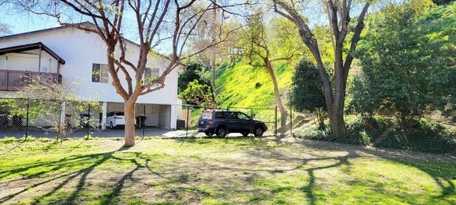 Building Photo - Charming 2BR Retreat with Private Patio, Scenic Views & Resort-Style Amenities