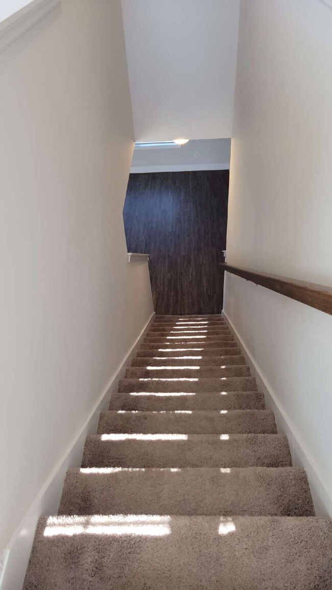 Building Photo - "Spacious 4-Bedroom Retreat with Modern Gr...